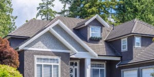 Home with energy efficient shingle roofing