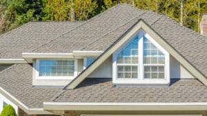 Light gray asphalt shingle roof on a two-story home