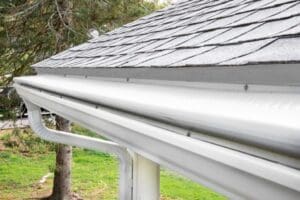 White rain gutters with gutter guards