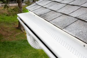 Overhead view of seamless gutter system with gutter guards