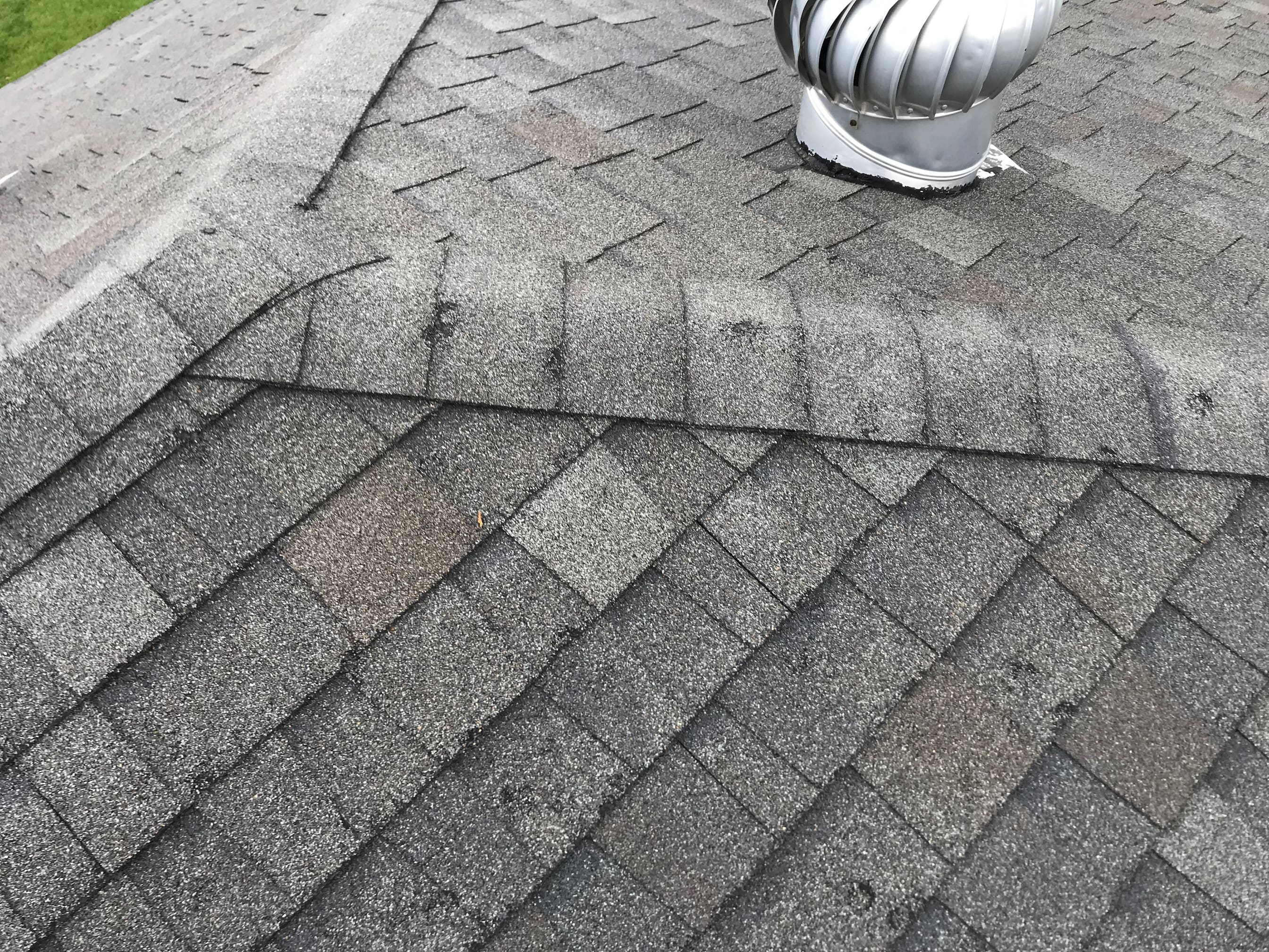 hail damage on asphalt shingle roof 